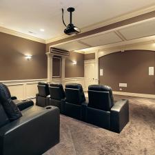 Theater in luxury home with stadium seating